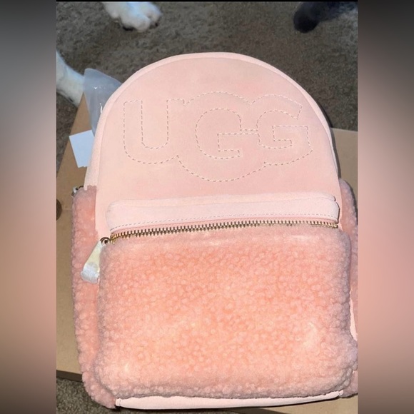 UGG Handbags - I’m selling because I hate the color pink! It was gifted to me.